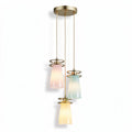 Three-light pendant lamp with glass shades in pastel colors and metal accents