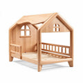 Wooden house-shaped toddler bed with slatted base and natural finish